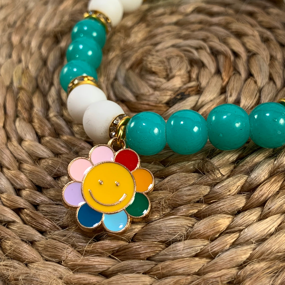 Jelly and mate beads bracelet with sunflower charm