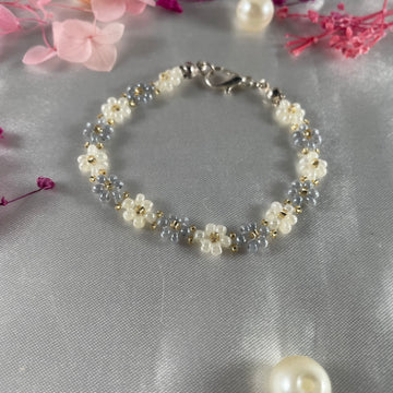 Daisy Flowers bracelet, made with Grey, Off-White, Golden bead finishing