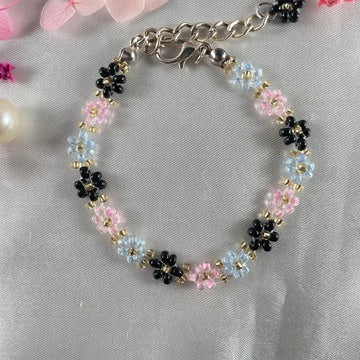 Daisy Flowers bracelet, made with rose Pink , Light Blue, black Colour, Golden bead finishing
