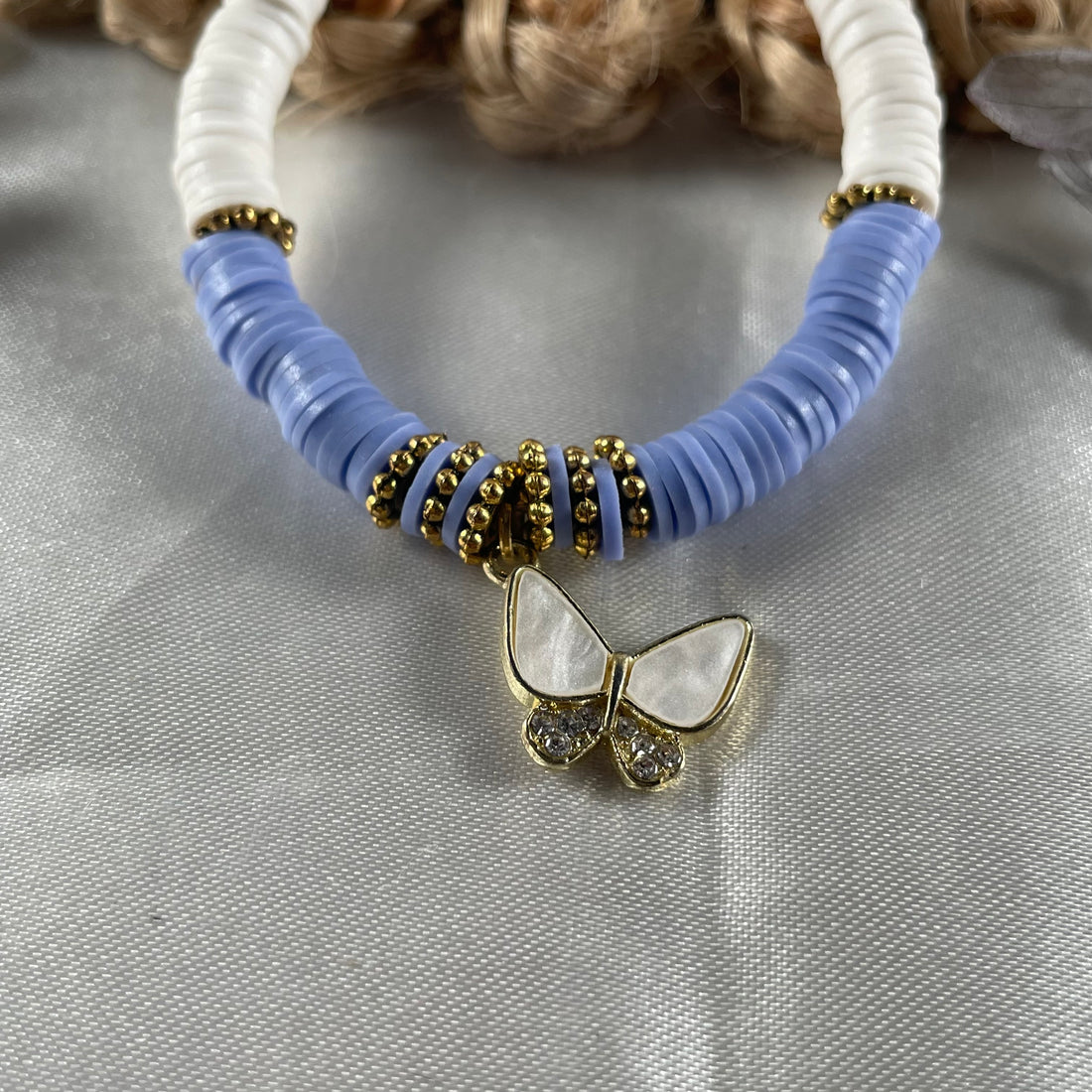 Premium blue and white fimo bead bracelet with butterfly charm