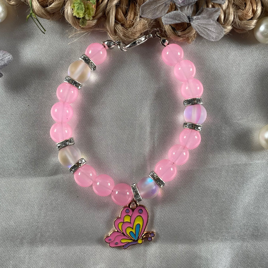 Premium pink aura and jelly bead bracelet with butterfly charm