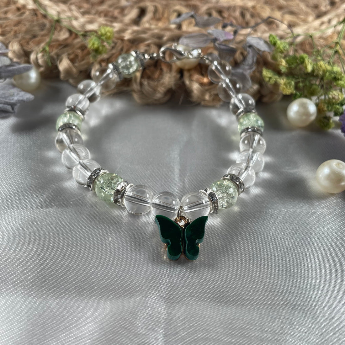 Premium crystal crack and jelly bead bracelet with butterfly charm