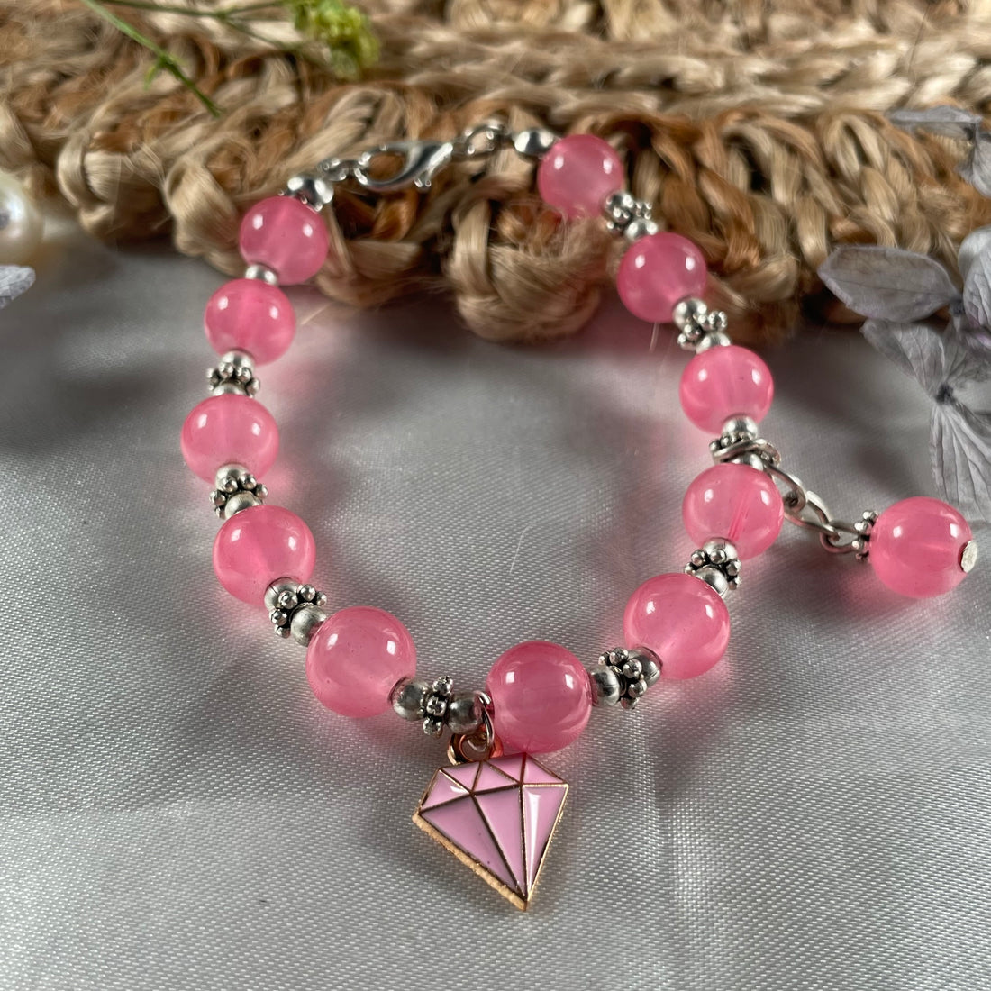 Premium pink beads bracelet with diamond charm