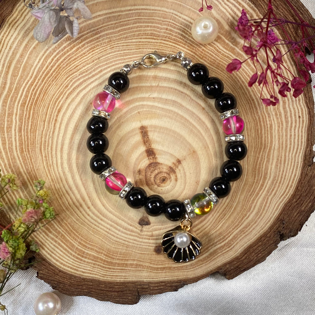 Charm bracelets black jelly  with pink aura beads and shell charm