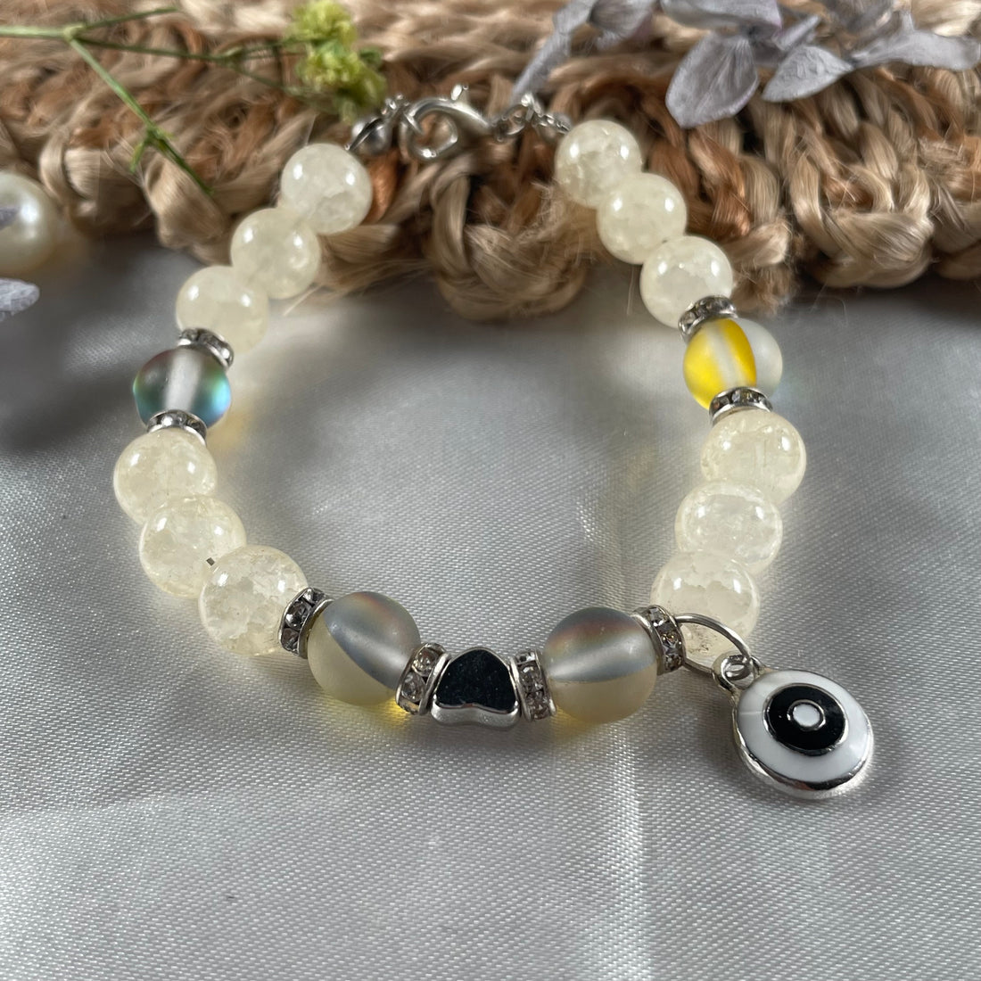 Premium yellow aura and crack beads bracelet with evil eye charm