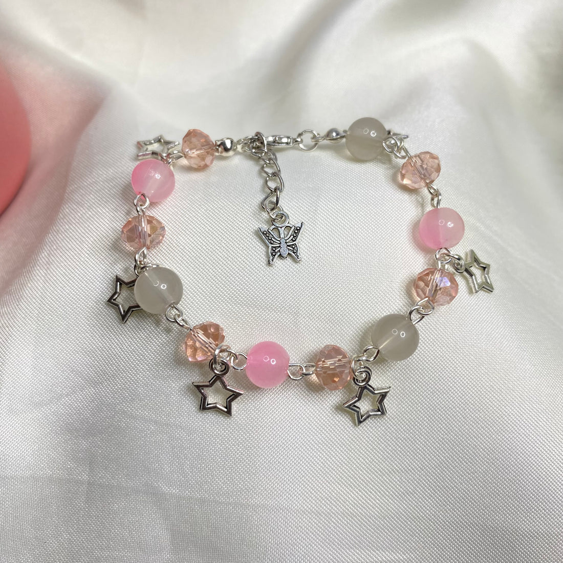 Pink and peach blend with star charms bracelet fairy design