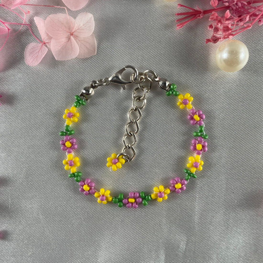 Daisy Flowers bracelet, made with Pastel Pink and Yellow Colour, Green bead finishing