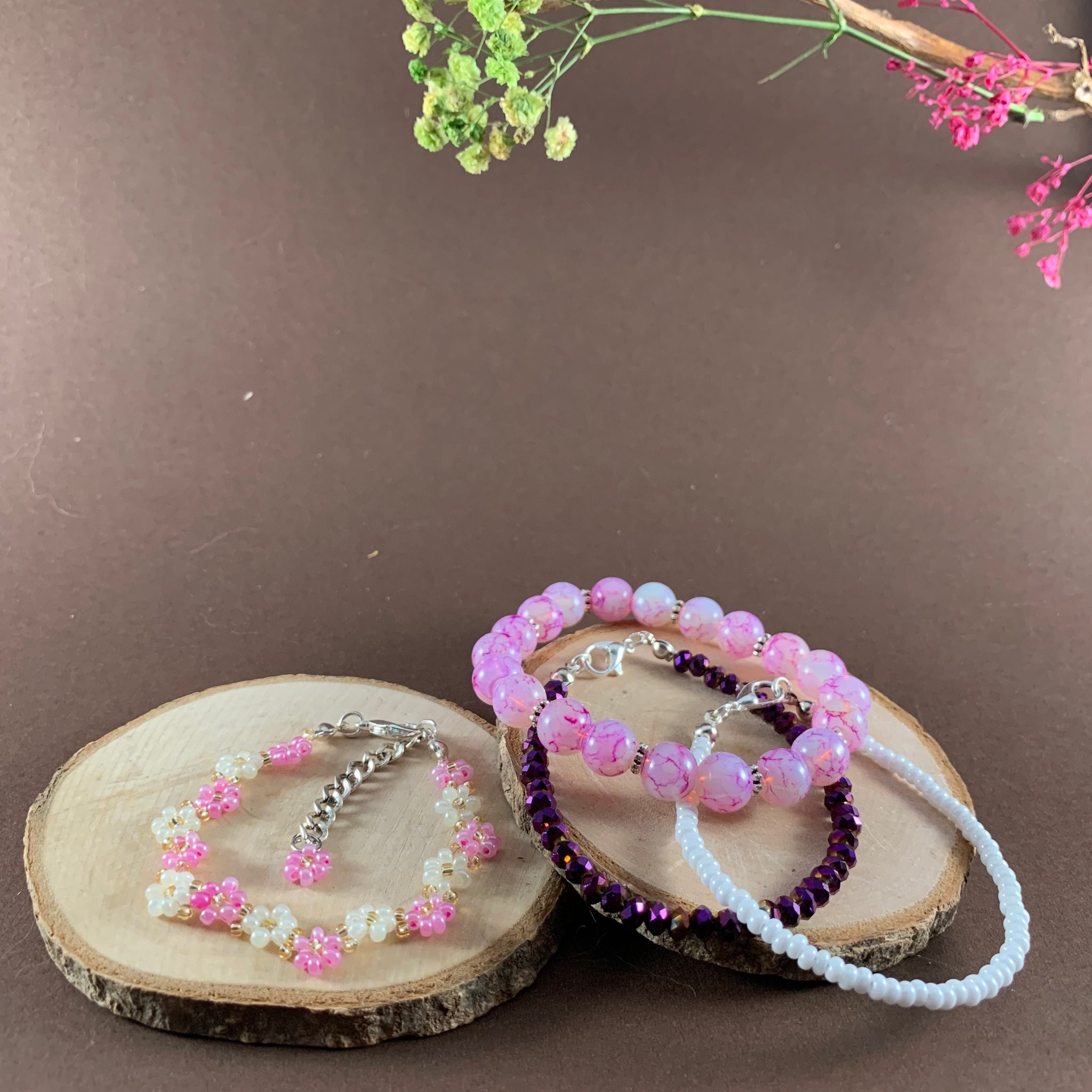 Pink stack bracelets set of 4 with daisy bracelet