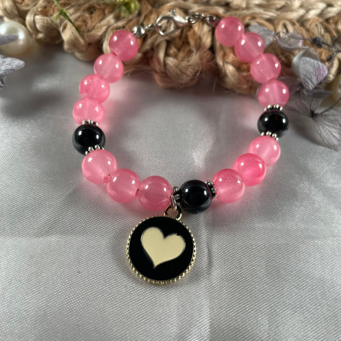 Premium black and candy pink jelly bead bracelet with heart charm