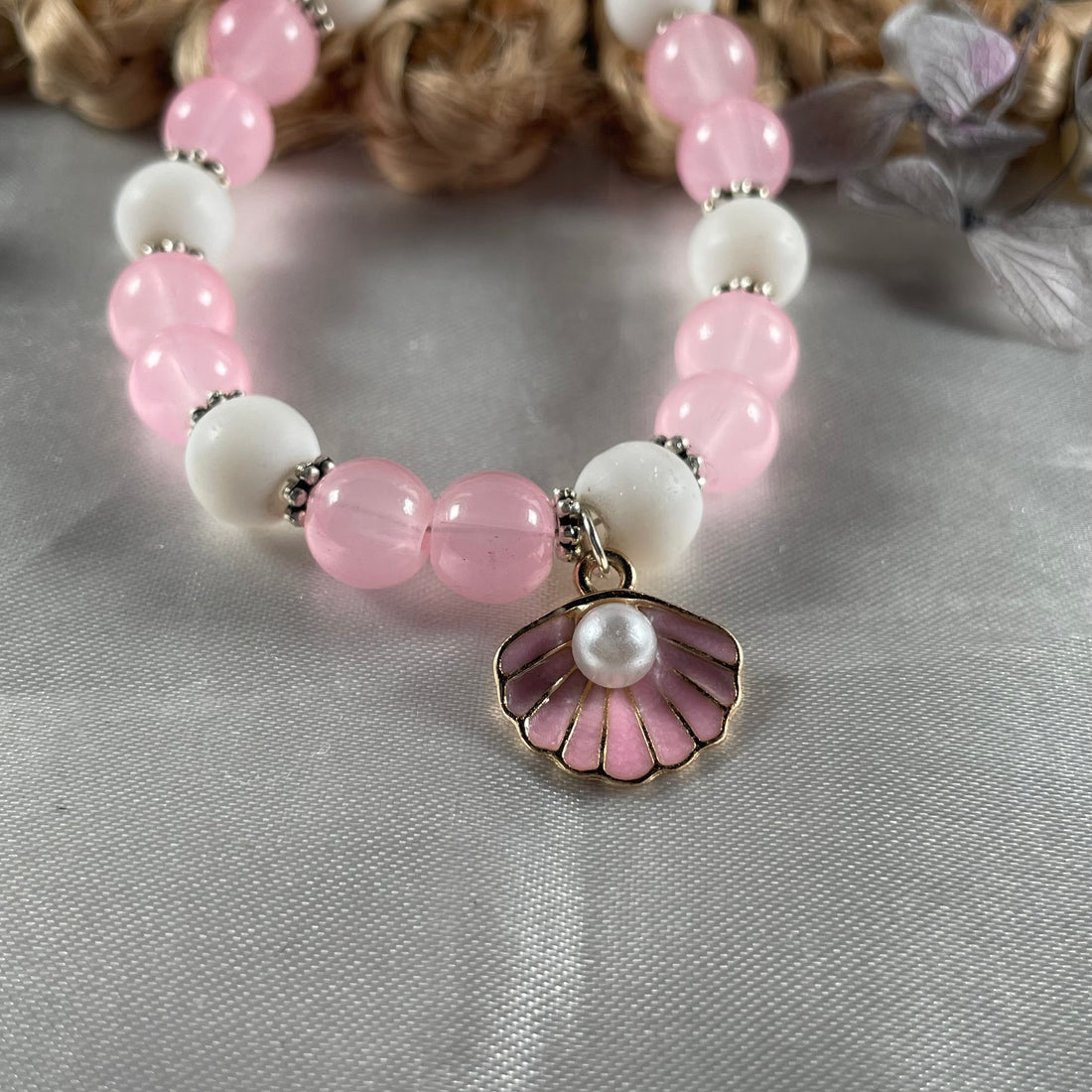 Premium pink jelly and matte white bead bracelet with pink shell charm