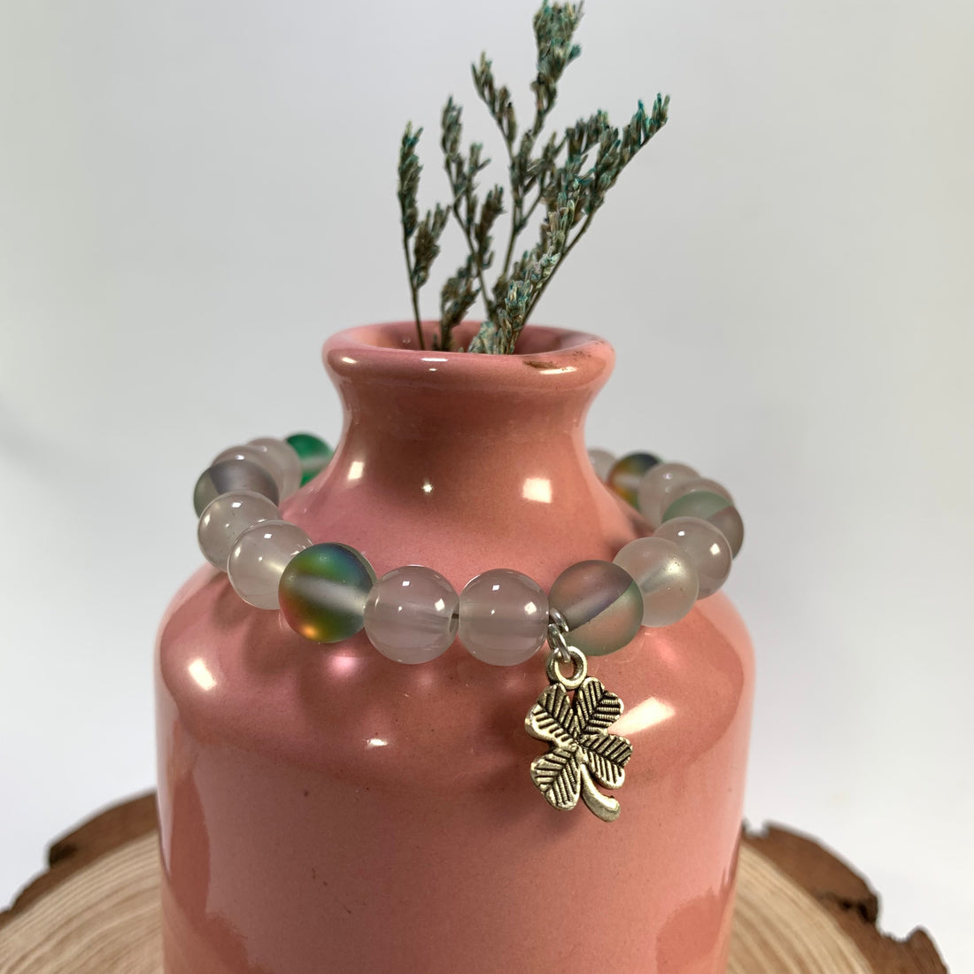 Jelly and aura beads bracelet with flower charm