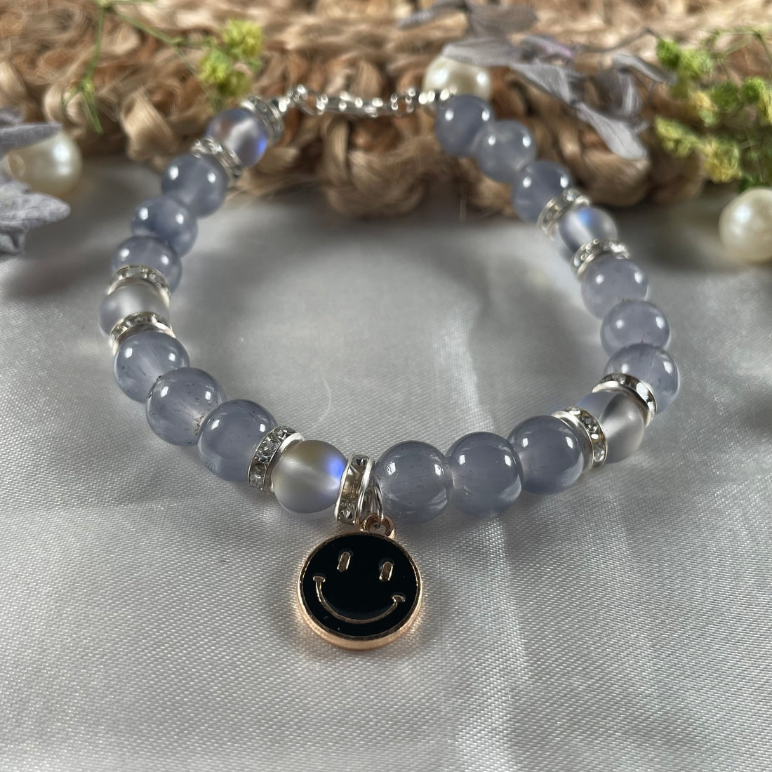 Premium aura and gray jelly bead bracelet with charm