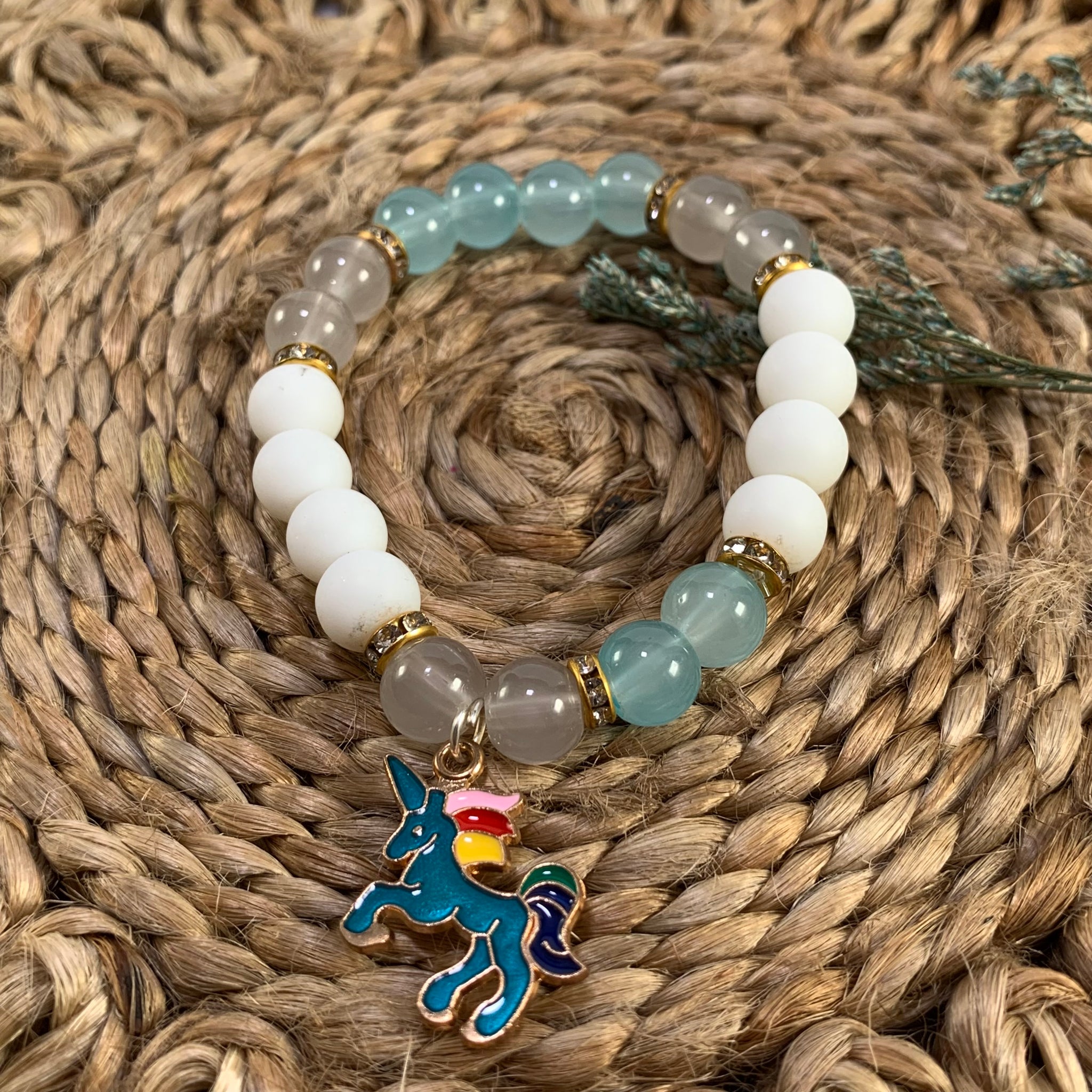 Jelly and mate beads bracelet with unicorn charm