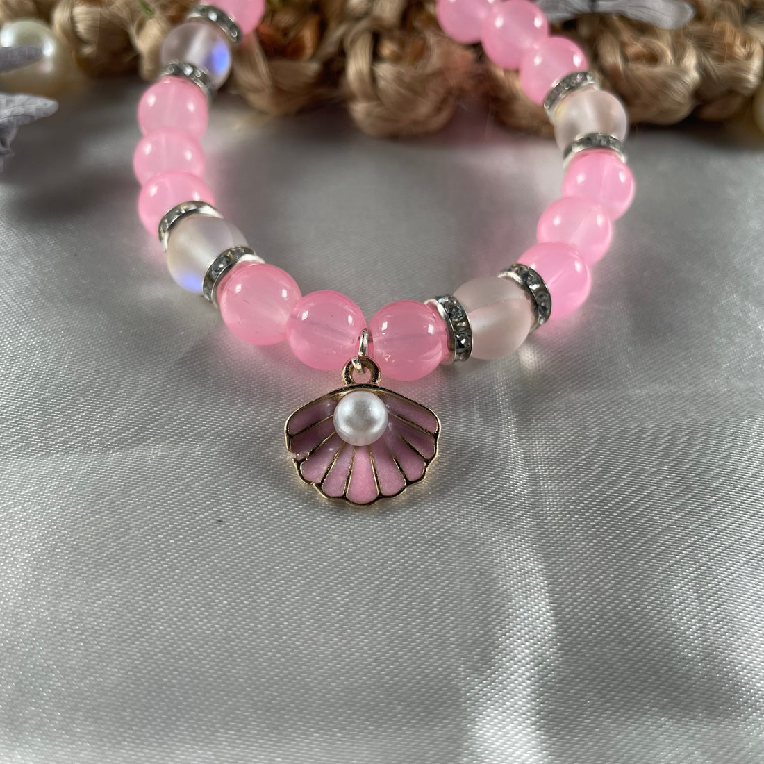 Premium pink aura and jelly bead bracelet with shell charm